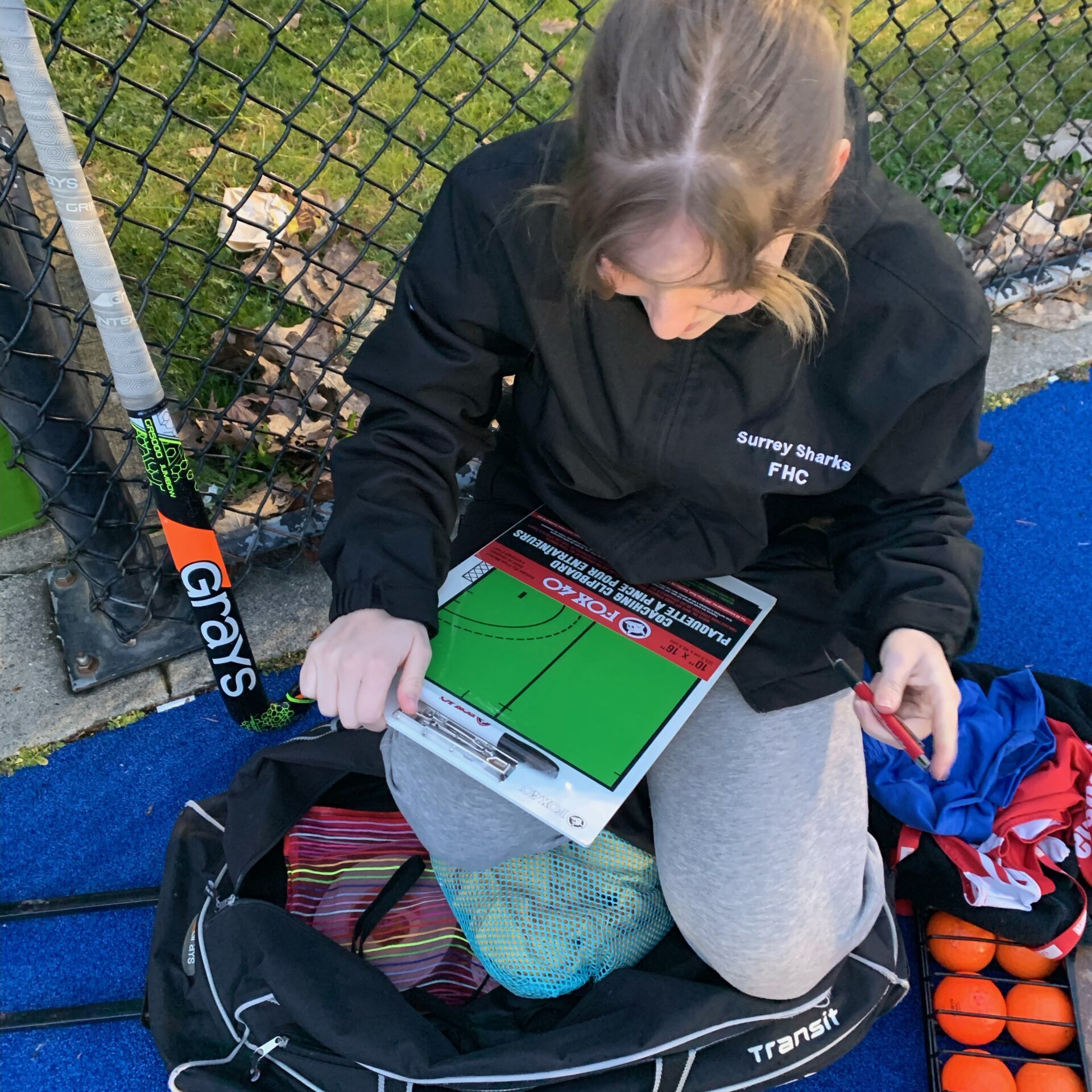 Coach Lucy preparing for a game!